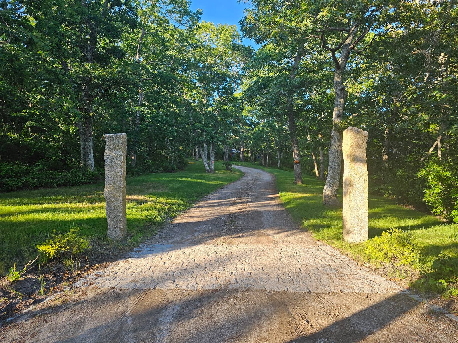 Two granite monoliths marking the entrance to Osprey's Point