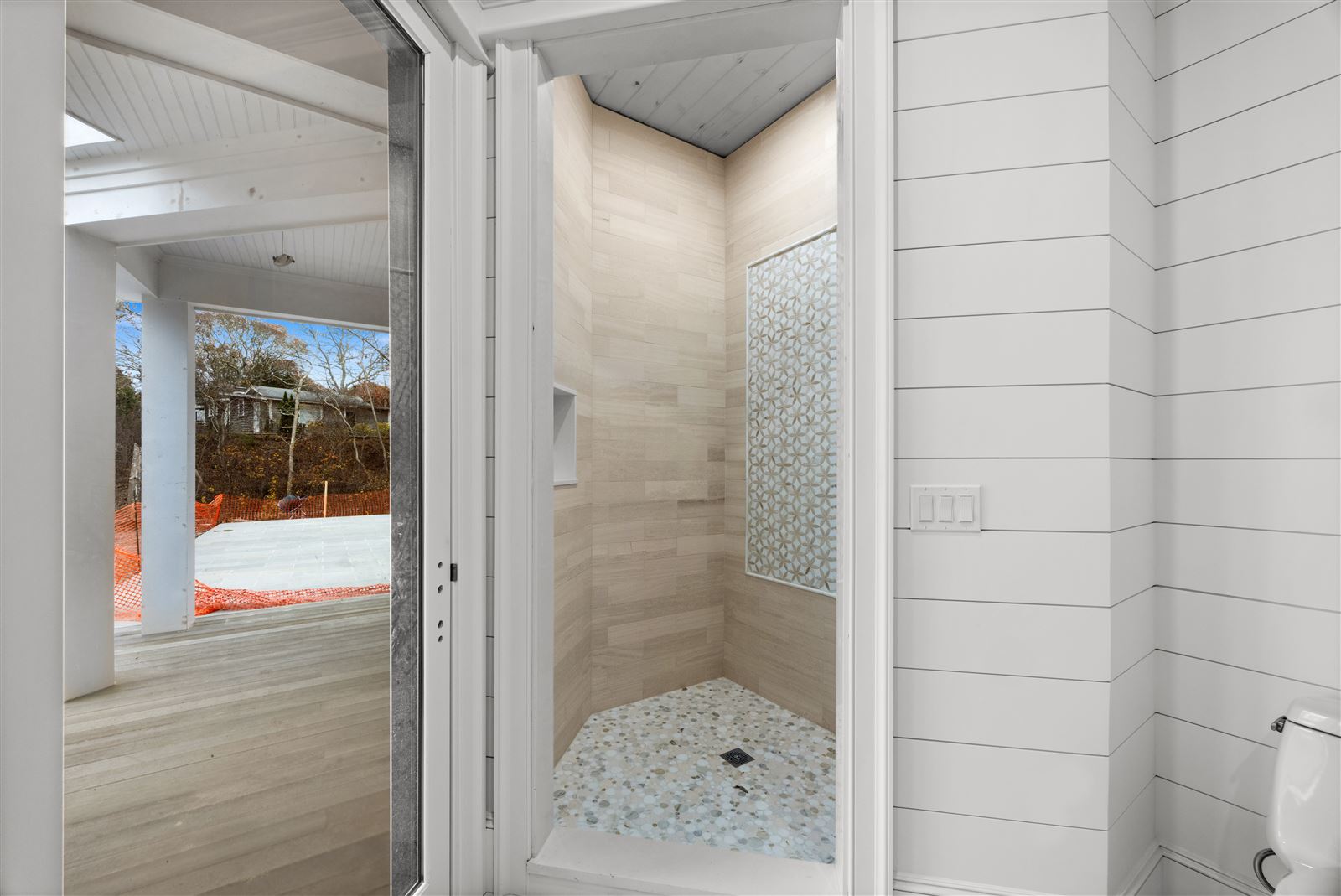 Walk-in shower, patterned tile
