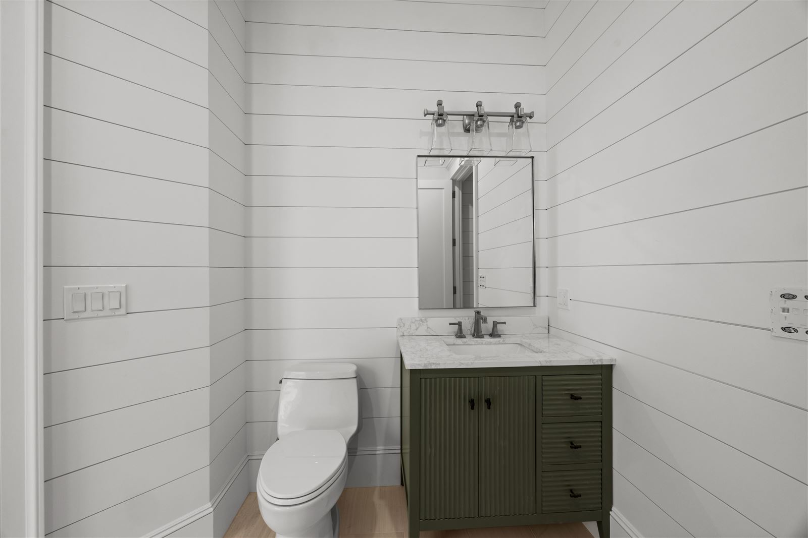 Powder room, green vanity