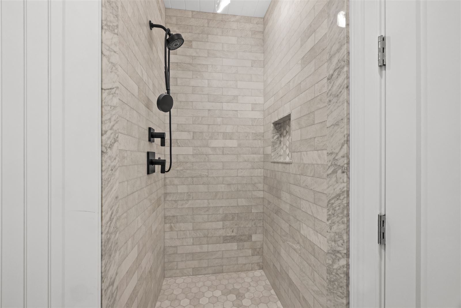 Marble shower, black fixtures